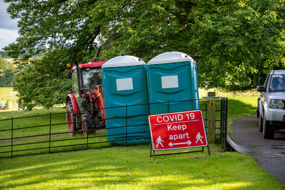 plastic-portable-toilets-behind-covid